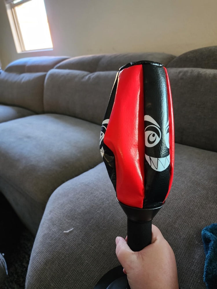 A cheap knockoff punching bag with a collapsed, creased shell