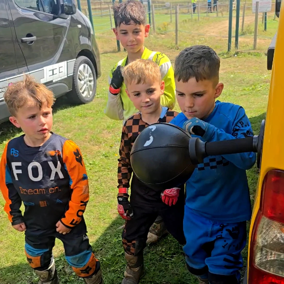 Group of children taking turns with a FUNPUNCH Rage-Bag